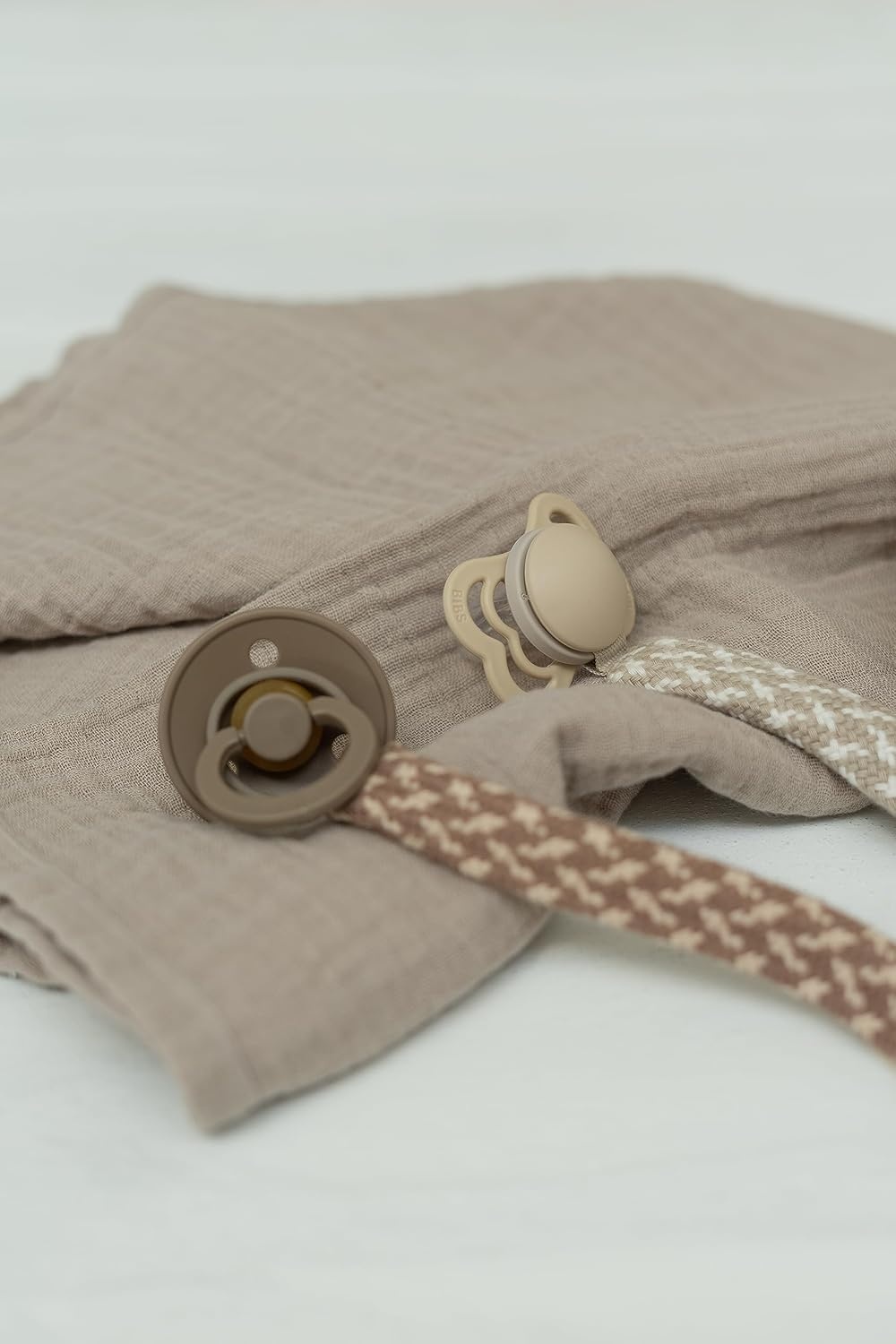 image:imageBIBS Paci Braid Pacifier String Organic Cotton Danish Design OneSize 036 Months IvoryVanillaSageIvory